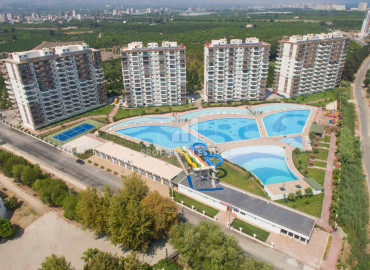Apartment 1+1, 2+1, 3+1 in a large-scale luxury residence in Kargipınari, Mersin, 250m from the sea ID-9284 фото-1
