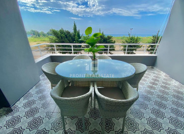 View design apartment 3 + 1 in a residence with a swimming pool 50m from the sea in the area of Mersin - Kargipinari ID-9286 фото-22