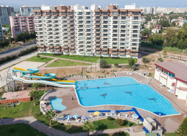 Two- and three-room apartments in a premium class complex 150m from the sea in Cesmeli, Mersin ID-9287 фото-1