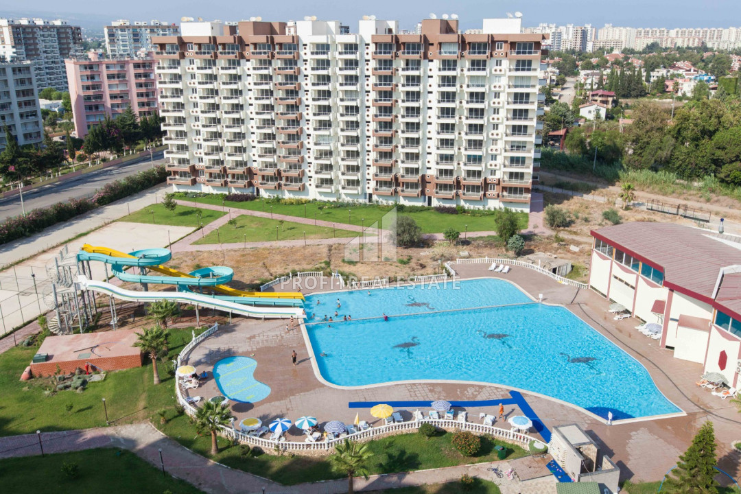 Two- and three-room apartments in a premium class complex 150m from the sea in Cesmeli, Mersin ID-9287 фото-1