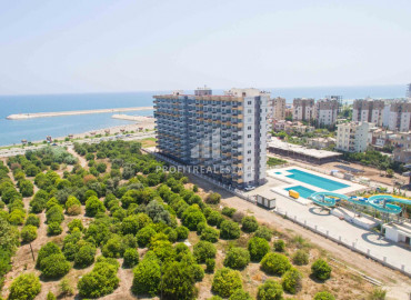 Apartment 1 + 1, 2 + 1 on different floors in a residence with a water park in the district center of Erdemli ID-9295 фото-4