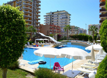 Large two bedroom apartment on the main street of Mahmutlar, overlooking the sea and mountains ID-9325 фото-18