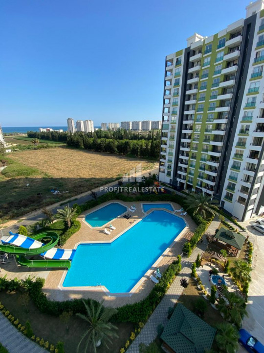 New apartment 3 + 1 in Tece, Mersin, in a residence with extensive facilities 300m from the sea ID-9327 фото-1
