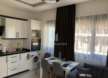 Furnished one-bedroom apartment in a new residence with good facilities in Mahmutlar ID-9350 фото-2