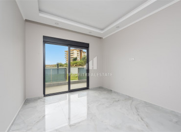 New apartment 1 + 1 with a private garden and swimming pool in a residence with good facilities in Avsallar ID-9359 фото-7