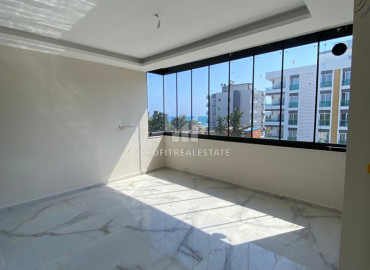 One bedroom apartment in a new residence, 75m from the sea in Tece, Mersin ID-9393 фото-1