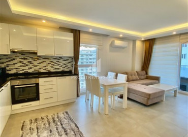Furnished one-bedroom apartment on a high floor in the western part of Mahmutlar, 500m from the sea ID-9395 фото-5