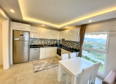 Furnished one-bedroom apartment on a high floor in the western part of Mahmutlar, 500m from the sea ID-9395 фото-6