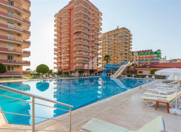 Large view apartment with two bedrooms on the first line in Mahmutlar ID-9396 фото-1