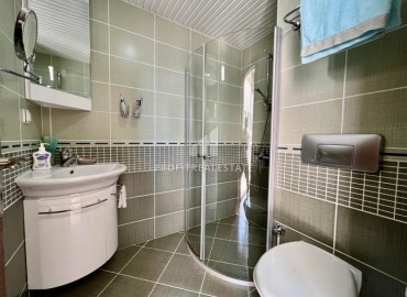 Large view apartment with two bedrooms on the first line in Mahmutlar ID-9396 фото-13