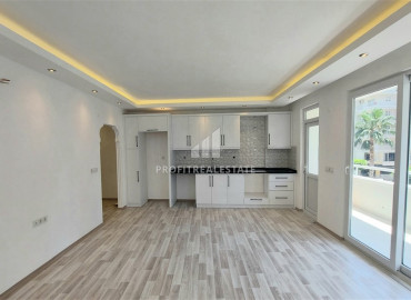 Renovated two bedroom apartment on the main street of Mahmutlar, 150 meters from the sea ID-9404 фото-4