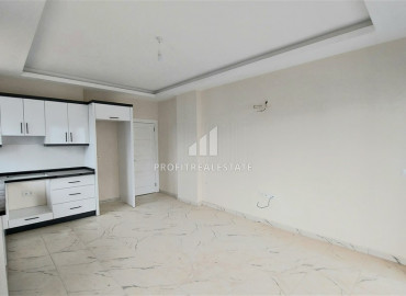 View duplex 3 + 1 in a new residence with a swimming pool, near the sea in Mahmutlar ID-9419 фото-5
