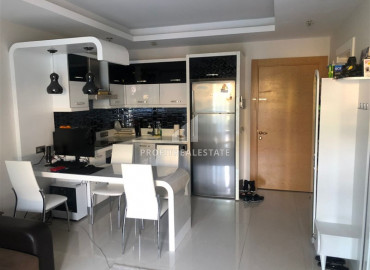 Furnished apartment 1 + 1 in a luxury residence at the foot of the Taurus Mountains in Mahmutlar ID-9424 фото-3