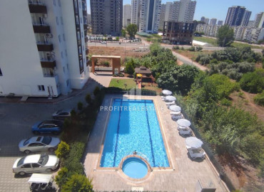 Large apartment with two bedrooms in a residence with a swimming pool in Tece, Mersin, 500m from the sea ID-9432 фото-1