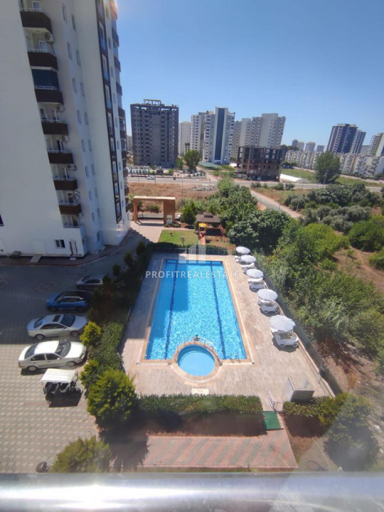 Large apartment with two bedrooms in a residence with a swimming pool in Tece, Mersin, 500m from the sea ID-9432 фото-1