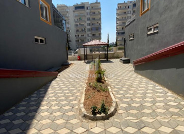Two bedroom apartment, 120m², in a new residence 500 meters from the sea in the area of Mersin - Tece ID-9433 фото-18}}