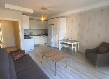 Spacious apartment 1 + 1 with mountain views in the center of Mezitli, Mersin ID-9435 фото-1}}