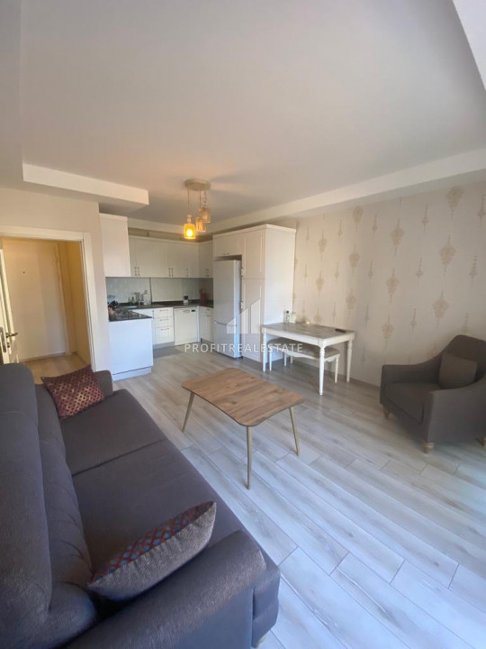 Spacious apartment 1 + 1 with mountain views in the center of Mezitli, Mersin ID-9435 фото-1