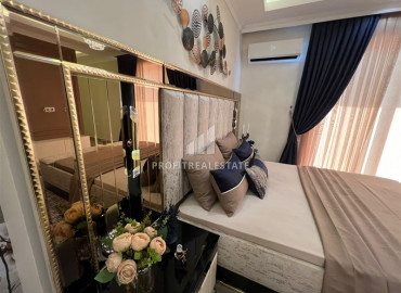 Недвижимость в 300м от моря: элегантный меблированный дуплекс 2+1, 125м² в Махмутларе ID-9454 фото-16