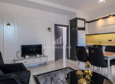 Stylish apartment by the sea, with one bedroom, 300 meters from the center of Mahmutlar, Alanya, 55 m2 ID-9458 фото-3