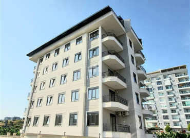 Меблированная двухкомнатная квартира в новом комплексе в Махмутларе в 400м от Средиземного моря ID-9463 фото-1
