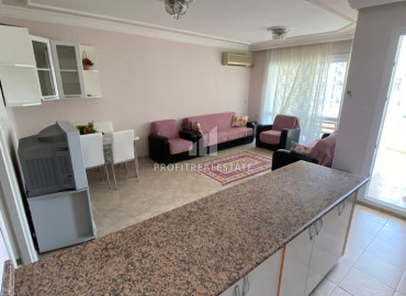 Two bedroom apartment in a residence with a swimming pool 150m from the sea in Mersin-Tece at an attractive price ID-9465 фото-4}}