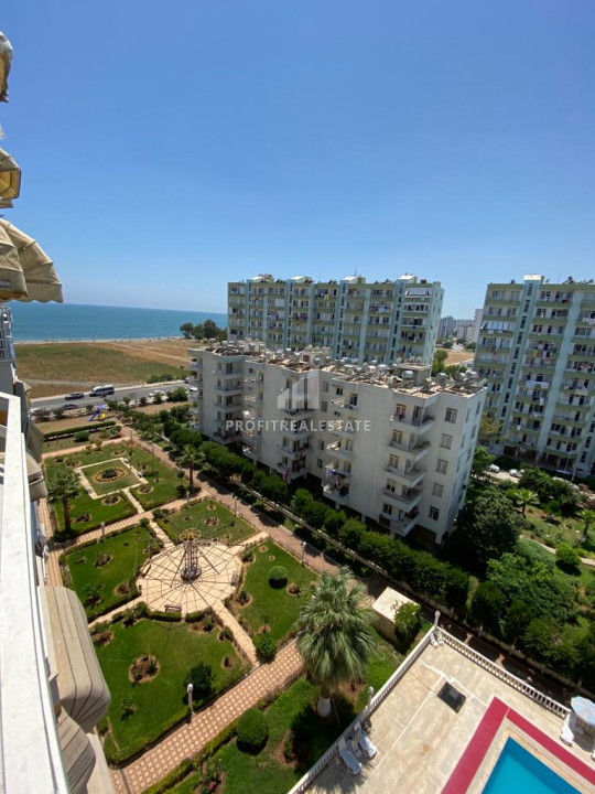 Two bedroom apartment in a residence with a swimming pool 150m from the sea in Mersin-Tece at an attractive price ID-9465 фото-1