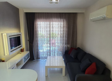 Уютная квартира с мебелью в самом центре Алании в комплексе Granada City ID-9468 фото-1