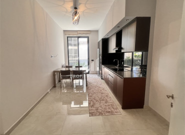 Furnished two bedroom apartment with a separate kitchen in a premium residence in Mahmutlar ID-9485 фото-11
