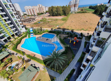 New apartment 3 + 1 in Tece, Mersin, in a residence with extensive facilities, 500m from the sea ID-9506 фото-1