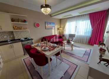 Two bedroom furnished apartment in a residence with a swimming pool, overlooking the sea in Mahmutlar ID-9511 фото-3