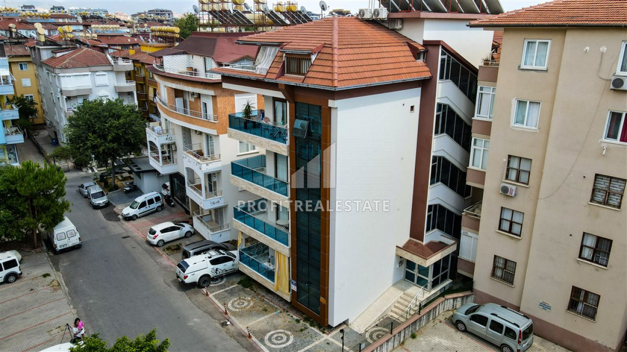 Furnished two-bedroom apartment in an urban building in the center of Alanya ID-9513 фото-2