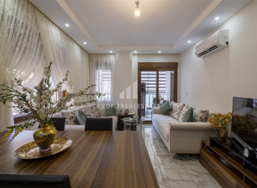 Furnished two-bedroom apartment in an urban building in the center of Alanya ID-9513 фото-1