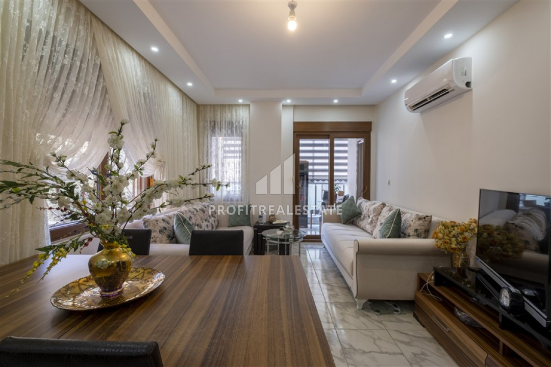 Furnished two-bedroom apartment in an urban building in the center of Alanya ID-9513 фото-1