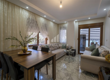 Furnished two-bedroom apartment in an urban building in the center of Alanya ID-9513 фото-5