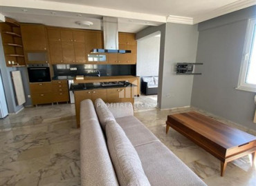 Renovated furnished apartment 2 + 1 in a cozy residence on the first coastline in Mahmutlar ID-9551 фото-3