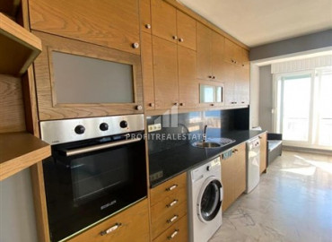 Renovated furnished apartment 2 + 1 in a cozy residence on the first coastline in Mahmutlar ID-9551 фото-5