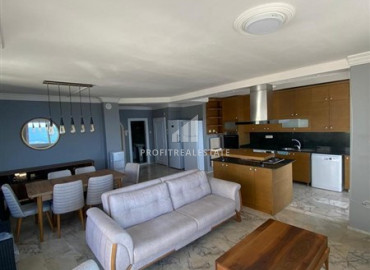 Renovated furnished apartment 2 + 1 in a cozy residence on the first coastline in Mahmutlar ID-9551 фото-1