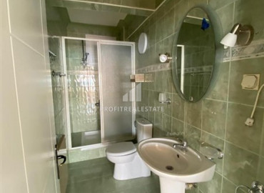 Renovated furnished apartment 2 + 1 in a cozy residence on the first coastline in Mahmutlar ID-9551 фото-11