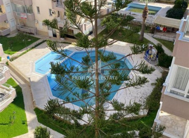 Renovated furnished apartment 2 + 1 in a cozy residence on the first coastline in Mahmutlar ID-9551 фото-13