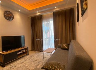 Меблированная квартира с одной спальней на высоком этажев новом элитном комплексе в Махмутларе ID-9571 фото-1