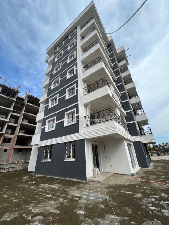 One bedroom apartment 150 meters from the sea in the most popular area of Mersin - Tece. ID-9579 фото-1