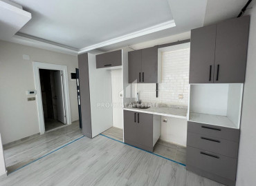One bedroom apartment 150 meters from the sea in the most popular area of Mersin - Tece. ID-9579 фото-4