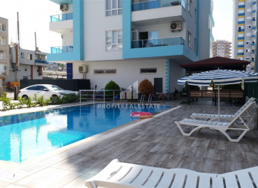 Spacious duplex 4 + 1 with designer interior in the center of Mahmutlar, 350 meters from the sea ID-9618 фото-1