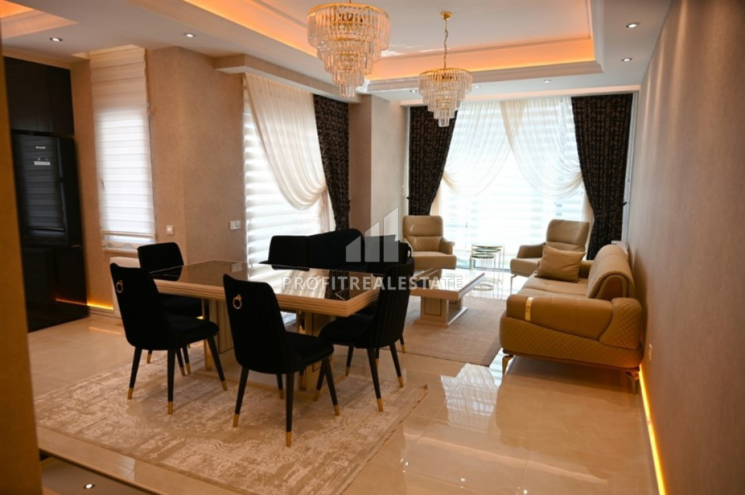 Elegant 2 + 1 apartment with designer interior in a new luxury residence in Mahmutlar ID-9630 фото-2