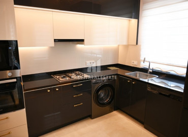 Elegant 2 + 1 apartment with designer interior in a new luxury residence in Mahmutlar ID-9630 фото-4