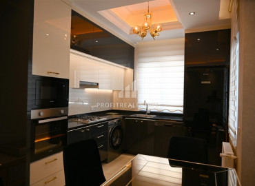 Elegant 2 + 1 apartment with designer interior in a new luxury residence in Mahmutlar ID-9630 фото-5