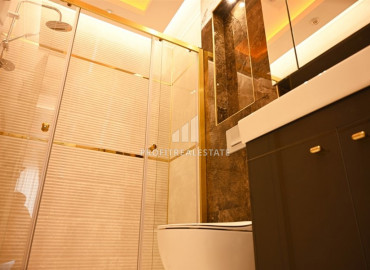 Elegant 2 + 1 apartment with designer interior in a new luxury residence in Mahmutlar ID-9630 фото-7