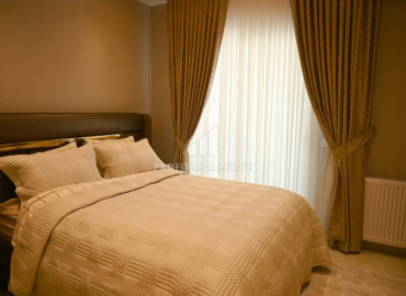 Elegant 2 + 1 apartment with designer interior in a new luxury residence in Mahmutlar ID-9630 фото-8