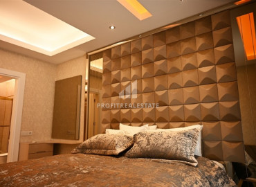 Elegant 2 + 1 apartment with designer interior in a new luxury residence in Mahmutlar ID-9630 фото-11